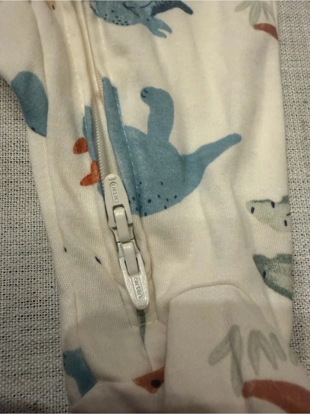 Carter's Cream Dino Print Footed One-Piece in Blue and Rust